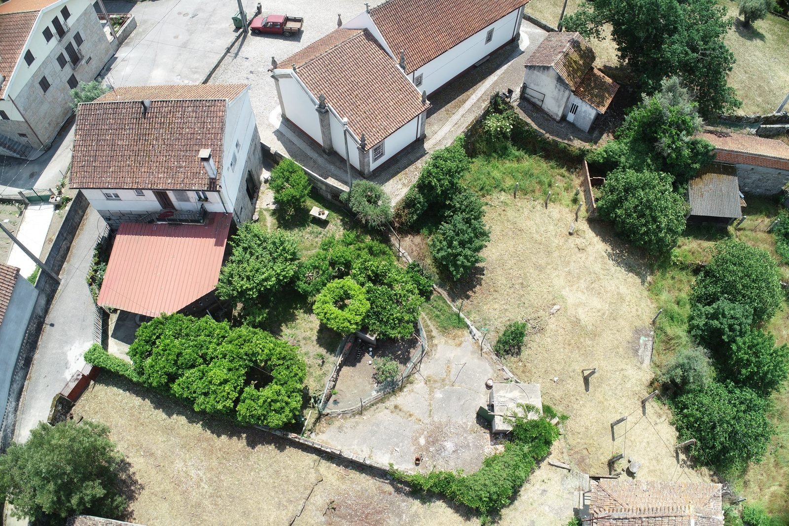 Aerial view of the chapel and neighboring buildings, May 2023