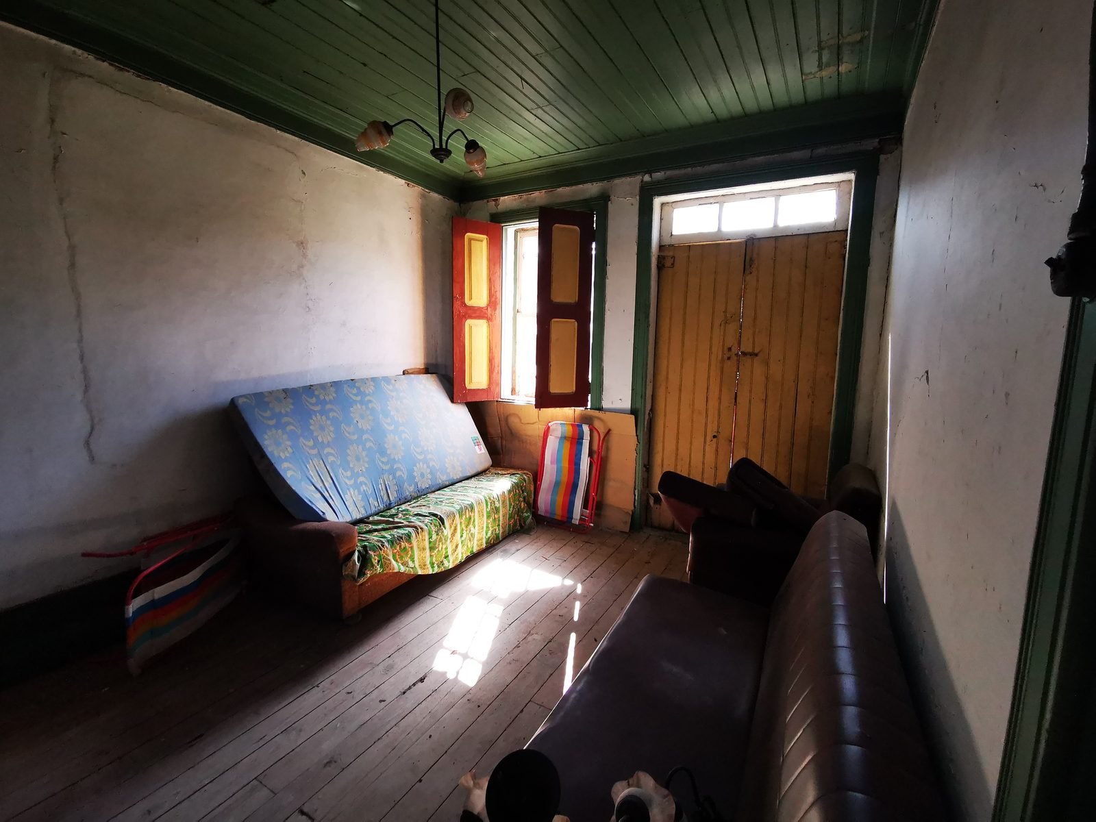 An interior room as found, still furnished from the previous owners