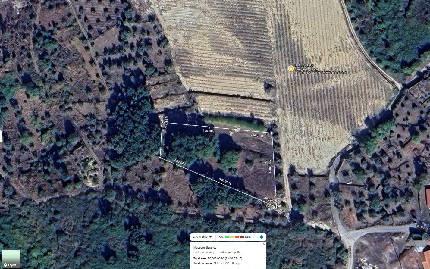 Google Earth satellite view of the glamping and vineyard plot, with measured boundary lines